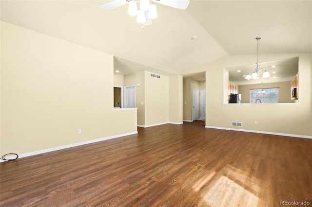 unfurnished living room with baseboards, visible vents, vaulted ceiling, and dark wood-type flooring