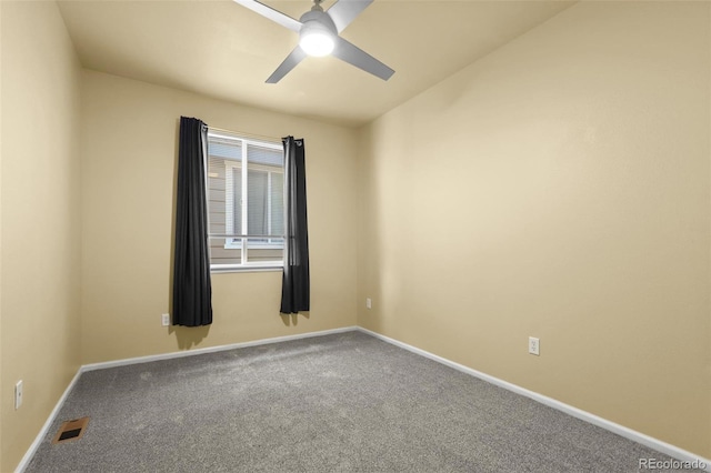 spare room featuring baseboards, visible vents, ceiling fan, and carpet flooring