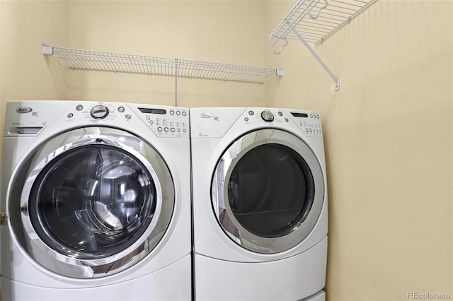 laundry room with washing machine and dryer and laundry area