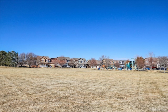 view of yard featuring a residential view