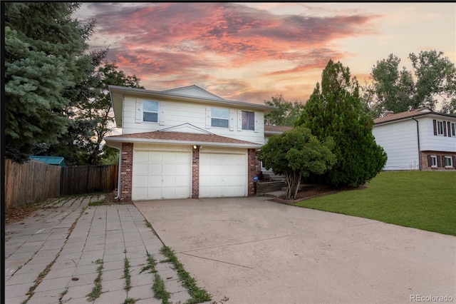 1775 S Memphis St, Aurora, CO 80017 - view of front of home with brick siding, driveway, and a garage