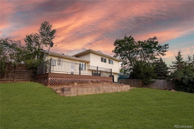 1775 S Memphis St, Aurora, CO 80017 - rear view of house featuring a fenced backyard and a deck