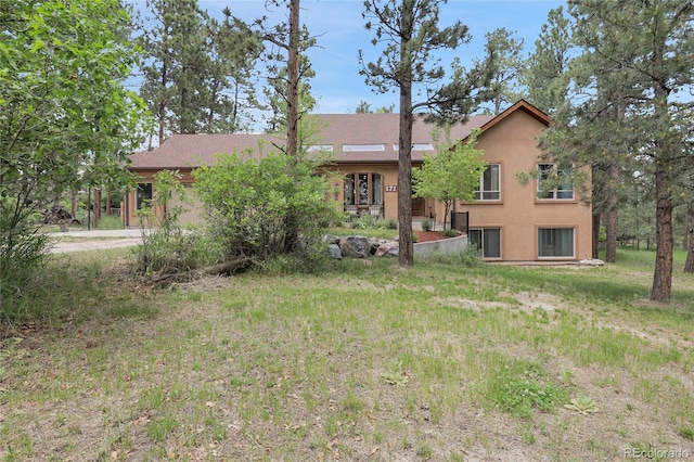 171 Columbine St, Larkspur, CO 80118 - view of front of house with stucco siding