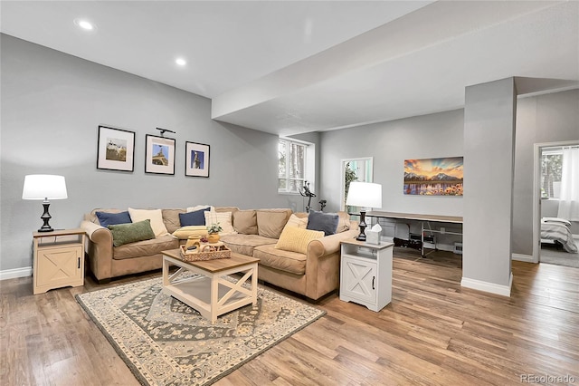 171 Columbine St, Larkspur, CO 80118 - living room with healthy amount of natural light, light wood-style floors, and recessed lighting