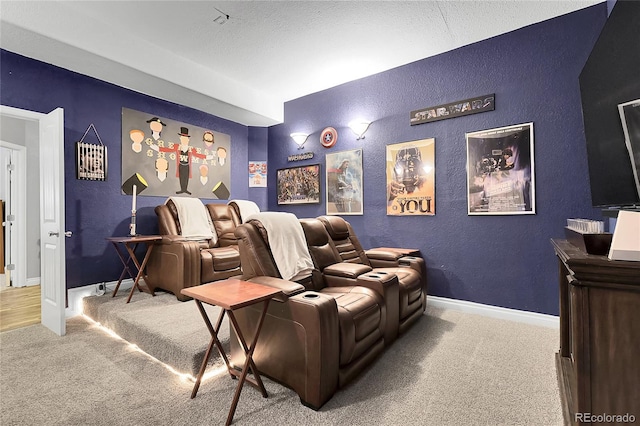 171 Columbine St, Larkspur, CO 80118 - carpeted cinema room featuring a textured wall and a textured ceiling
