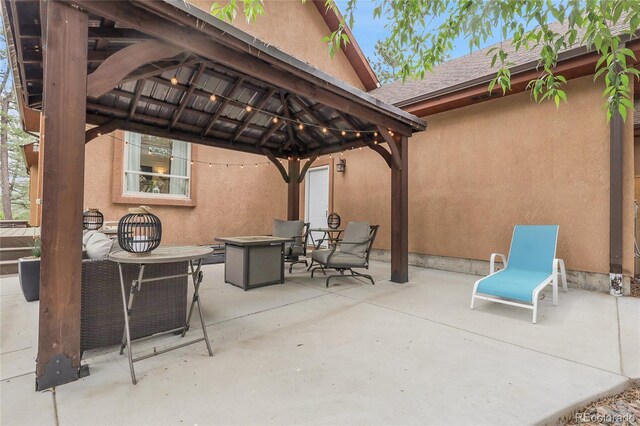 171 Columbine St, Larkspur, CO 80118 - view of patio / terrace featuring a gazebo and a fire pit