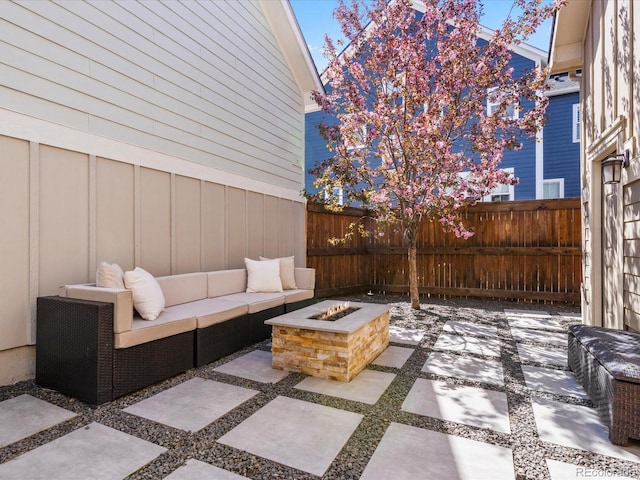 5511 Wabash St, Denver, CO 80238 - view of patio featuring fence and an outdoor living space with a fire pit