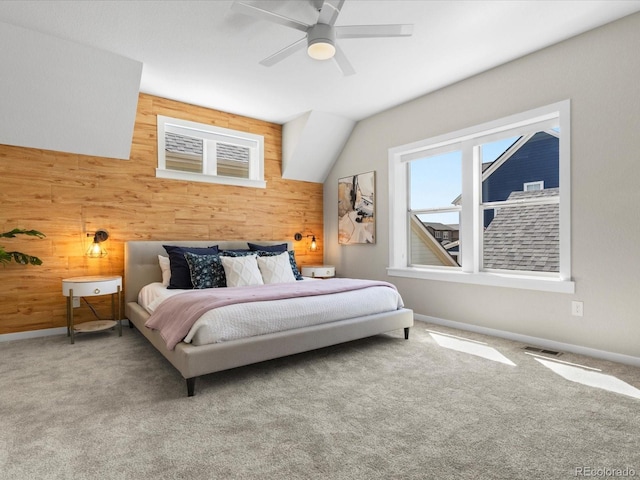 5511 Wabash St, Denver, CO 80238 - carpeted bedroom with wooden walls, baseboards, and a ceiling fan