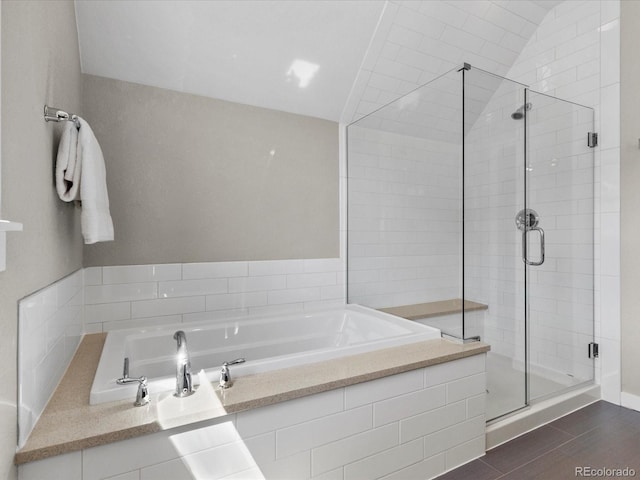 5511 Wabash St, Denver, CO 80238 - full bath with a stall shower, a garden tub, and wood finished floors