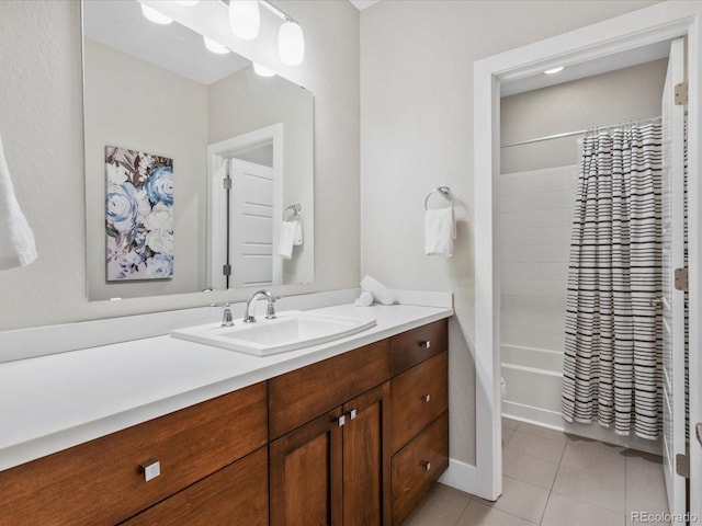 5511 Wabash St, Denver, CO 80238 - bathroom with vanity, tile patterned flooring, and shower / bath combo with shower curtain