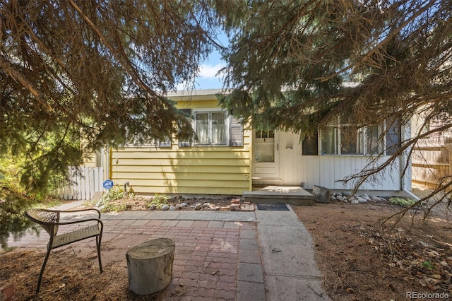 1665 S Madison St, Denver, CO 80210 - view of front of home featuring a patio area