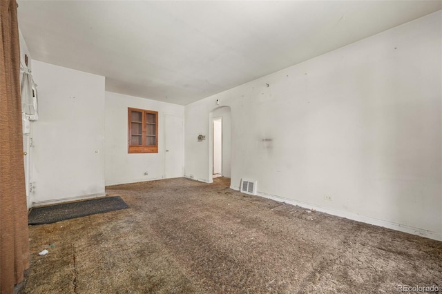 1665 S Madison St, Denver, CO 80210 - carpeted spare room with arched walkways