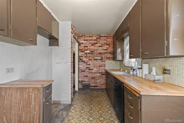 1665 S Madison St, Denver, CO 80210 - kitchen featuring black dishwasher, decorative backsplash, dark floors, and brick wall