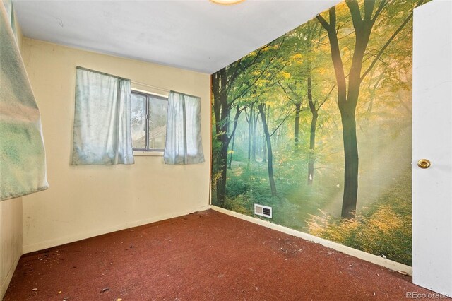 1665 S Madison St, Denver, CO 80210 - unfurnished room with baseboards