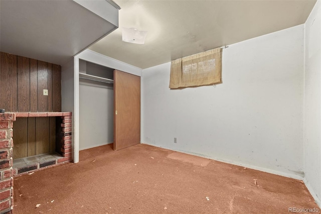1665 S Madison St, Denver, CO 80210 - unfurnished bedroom with carpet flooring, a closet, and a fireplace