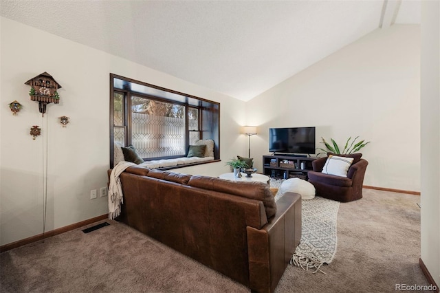 carpeted living room featuring lofted ceiling