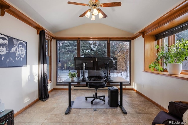 home office featuring light tile patterned floors, ceiling fan, and vaulted ceiling