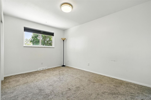 4604 Routt St, Wheat Ridge, CO 80033 - carpeted spare room with baseboards