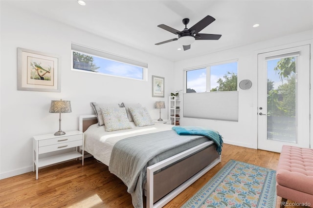 3932 Utica St, Denver, CO 80212 - bedroom featuring recessed lighting, wood finished floors, a ceiling fan, and access to exterior