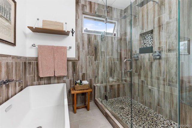3932 Utica St, Denver, CO 80212 - full bath with tile walls, a shower stall, and tile patterned floors