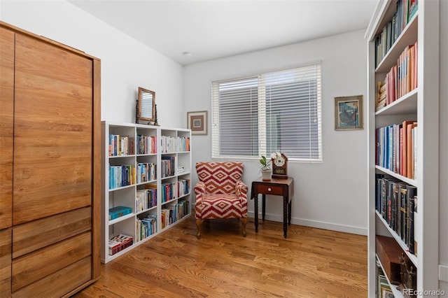 3932 Utica St, Denver, CO 80212 - living area featuring baseboards and wood finished floors