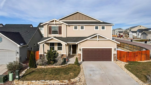 craftsman-style house featuring a garage and a front lawn