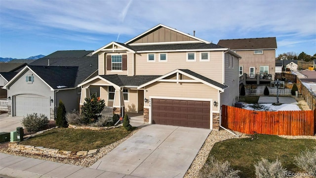 view of front of property featuring a garage and a front yard