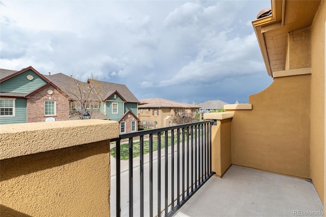 balcony featuring a residential view