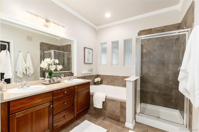 bathroom featuring a sink, double vanity, tile patterned floors, a shower stall, and a bath