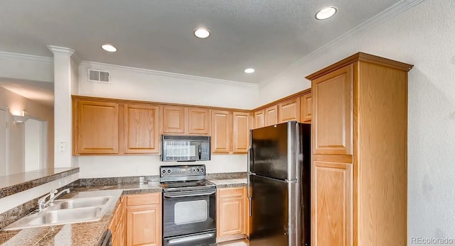 kitchen featuring black appliances, ornamental molding, and sink