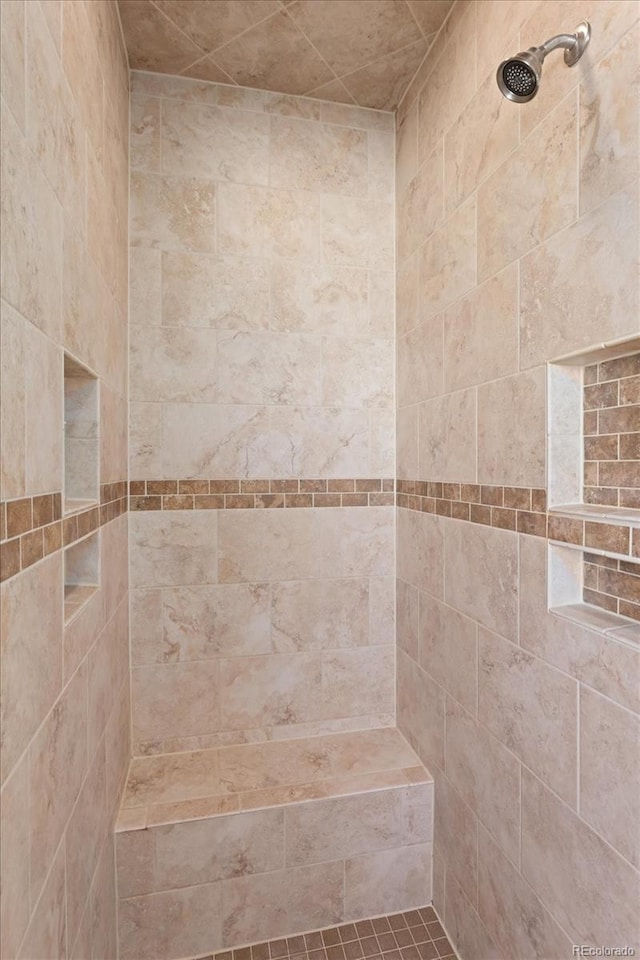 details featuring a tile shower