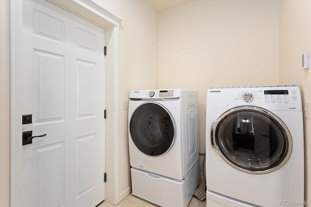 laundry area with separate washer and dryer