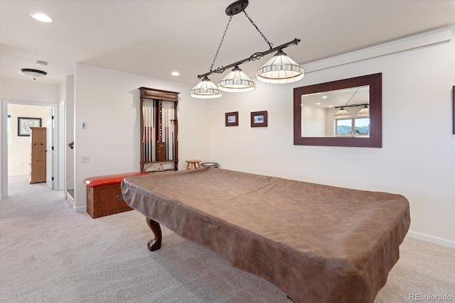 recreation room with pool table and light colored carpet