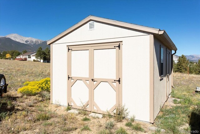 view of outdoor structure with a mountain view