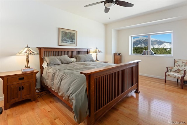 bedroom featuring ceiling fan and light hardwood / wood-style flooring