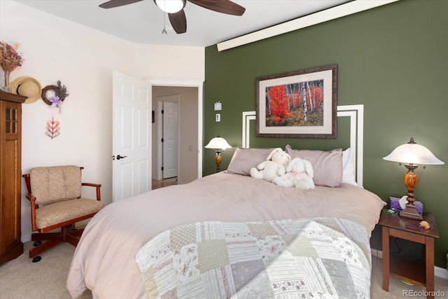 bedroom with ceiling fan and carpet