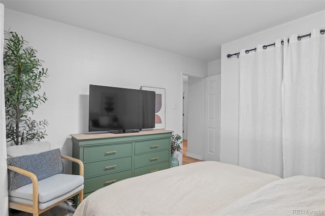 bedroom featuring wood-type flooring