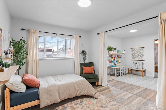 bedroom featuring light hardwood / wood-style flooring