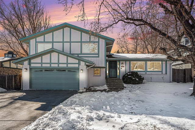 view of front of property with a garage