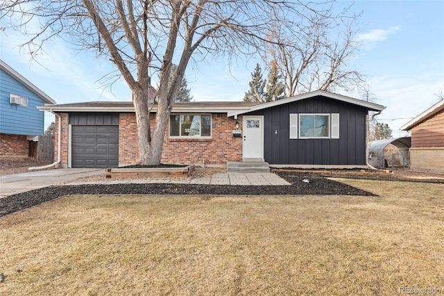 ranch-style home with a garage and a front yard