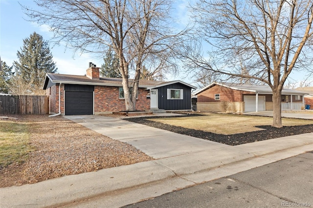 single story home featuring a garage