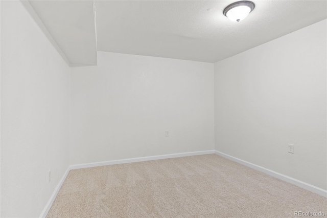 spare room with carpet flooring