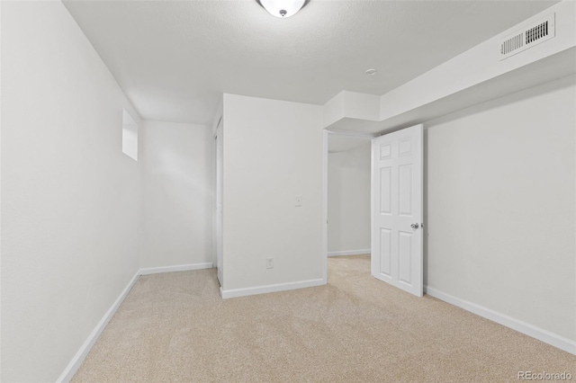 basement with light carpet