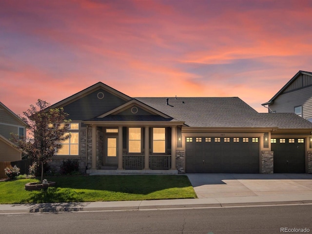 3853 S Malta St, Aurora, CO 80013 - view of front facade featuring a garage, a front yard, concrete driveway, a porch, and a shingled roof