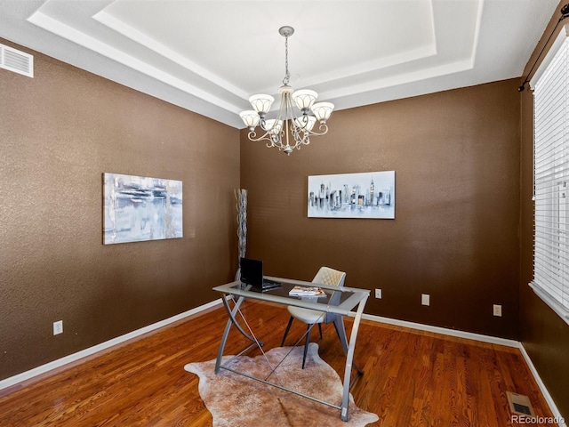 3853 S Malta St, Aurora, CO 80013 - office with a tray ceiling, a chandelier, and wood finished floors