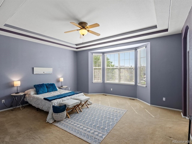 3853 S Malta St, Aurora, CO 80013 - bedroom with a tray ceiling, carpet, baseboards, and ceiling fan