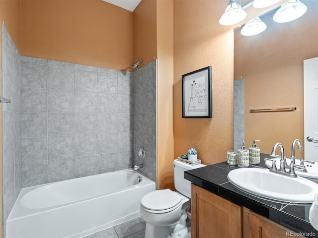3853 S Malta St, Aurora, CO 80013 - bathroom with toilet, vanity,  shower combination, and tile patterned floors