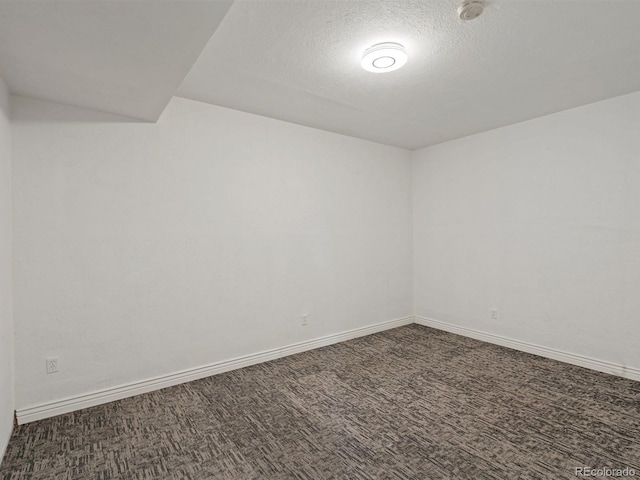 3853 S Malta St, Aurora, CO 80013 - empty room featuring baseboards, carpet flooring, and a textured ceiling