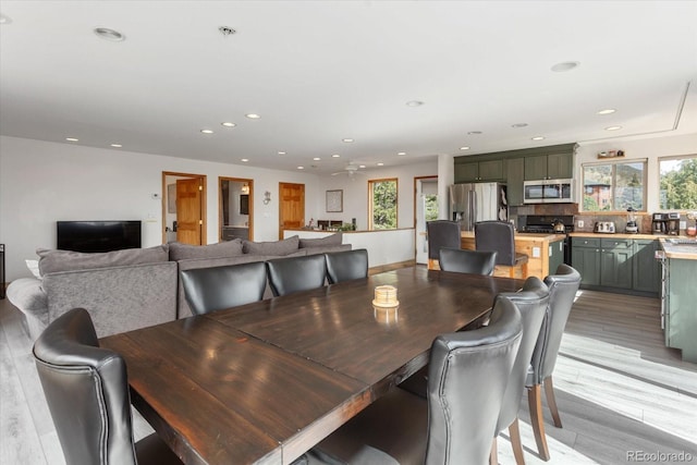 4236 Tranquil Way, Crestone, CO 81131 - dining space with recessed lighting, a wealth of natural light, and light wood-style flooring