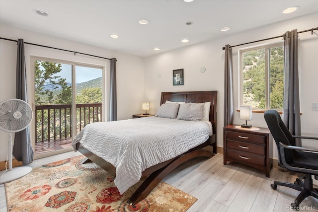 4236 Tranquil Way, Crestone, CO 81131 - bedroom with light wood-type flooring, recessed lighting, baseboards, and access to exterior